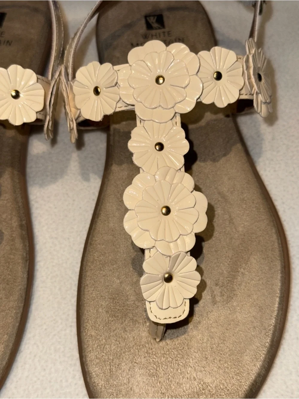 White Mountain Liftoff Flat Sandals feature delicate floral applique on T-strap